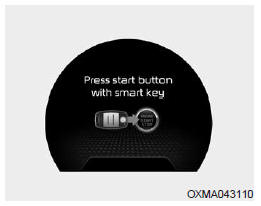 Appuyer sur le bouton de mise en marche avec la clé intelligente (pour le système de clé intelligente)