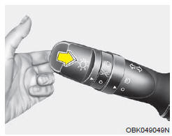 Pour faire clignoter les feux de route,