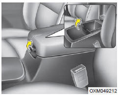 Pour ouvrir le bac de rangement de